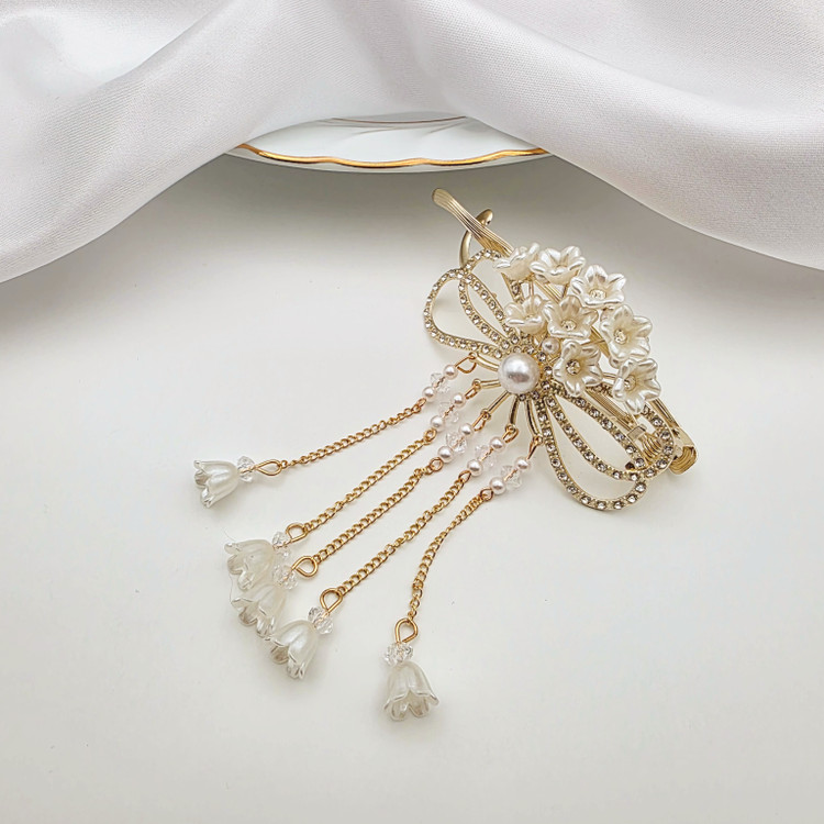 گیره چفتی مو زنانه مجلسی طلایی آویزدار طرح عروس